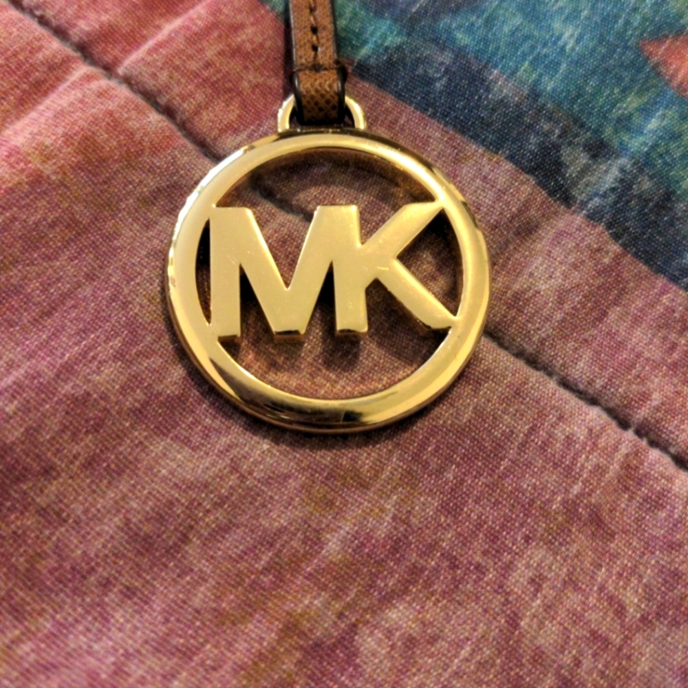 MK bag tag